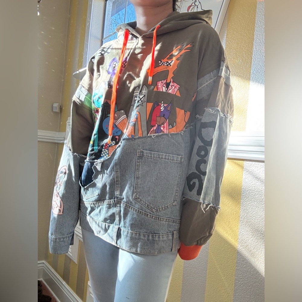 Graphic Patchwork Hoodie With Orange Accents - image 2